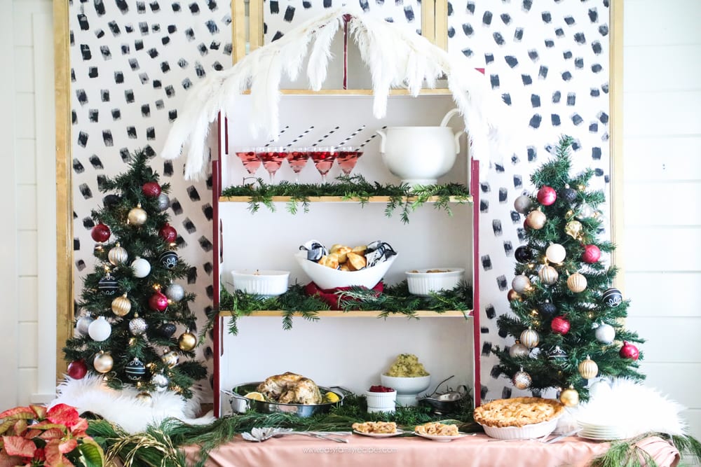 How did she make that DIY Dalmatian Print wallpaper?  It's easy!  || Jeweledinteriors, Dalmatian, diy, wallpaper, preppy, blush, peach, Burgundy, buffet, table, party, Christmas, holiday, ideas, black, white, gold, tutorial, step by step, inexpensive, paintable, wallpaper, wall paper