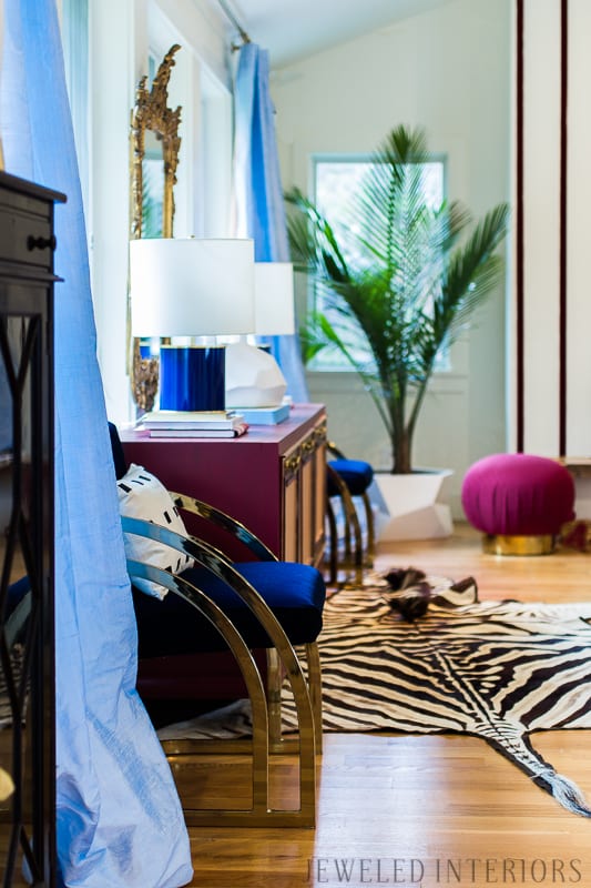 You've got to see this One Room Challenge Make-overs || Jeweledinteriors, antique mirror, One Room Challenge, ORC, parisian, apartment, rental, diy, zebra, rug, hide, milo baughman, navy, velvet, silk, curtains, brass, gold, chic, hardwood floors, antique, mirror, eclectic, kelly wearstler, pillow, kate spade, lamp, powder blue, obelisk, victorian, 1980's, vintage, living room, chic, roman bust, statue