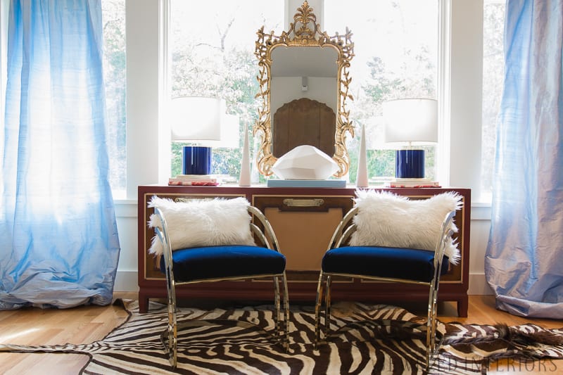 You've got to see this One Room Challenge Make-overs || Jeweledinteriors, One Room Challenge, ORC, parisian, apartment, rental, diy, zebra, rug, hide, milo baughman, navy, velvet, silk, curtains, brass, gold, chic, hardwood floors, antique, mirror, eclectic, kelly wearstler, pillow, kate spade, lamp, powder blue, obelisk, victorian, 1980's, vintage, living room, chic, roman bust, statue