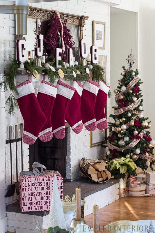 We are crushing on this HOLIDAY HOME TOUR!!! || Blush, Burgundy, white, black, gold, stockings, Christmas, holiday, tree, fireplace, stockings, monogram, wrapping paper