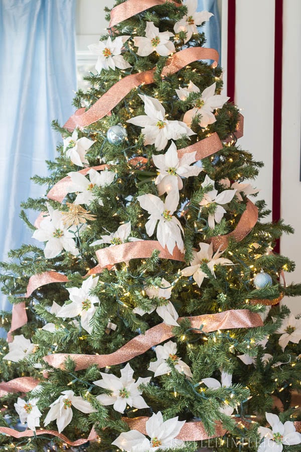 Looking for inspiration for Christmas Tree inspiration?  You have got to see this || Jeweled Interiors, Holiday, Home Tour, Burgundy, wine, Blush, Christmas, Decor, decoration, Ideas, Tips,  Christmas, holiday, tree,  pink, DIY, inspiration, red, maroon, ostrich feathers, poinsettia, glam, chic, peach, gold, black, white , eclectic, chic,  romantic