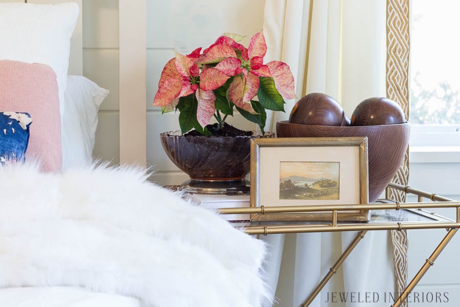 JUST A TOUCH OF CHRISTMAS IN THE BEDROOM. A white bedroom with pops of color: Looking for inspiration for a eclectic, chic, an glam Christmas? You have got to see this! Jeweled Interiors, Holiday, Home Tour, Burgundy, cranberry, blush, Christmas, Decor, Ideas, Tips, wreaths, Christmas, tree, decor, decorations, DIY, inspiration, red, maroon, wine, home tour, poinsettia, glam, chic, peach, gold, black, white