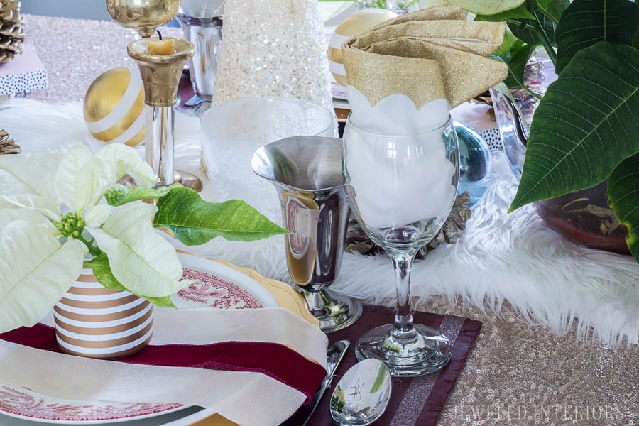 THIS DINING ROOM! Looking for inspiration for a eclectic, chic, and glam Christmas? Jeweled Interiors, Holiday, Home Tour, Burgundy, cranberry, blush, Decor, Ideas, Tips, wreaths, Christmas, tree, decor, decorations, DIY, inspiration, red, maroon, wine, home tour, poinsettia, glam, chic, peach, gold, black, white, Panton, chairs, brass, chandelier, tablescape, pinecones