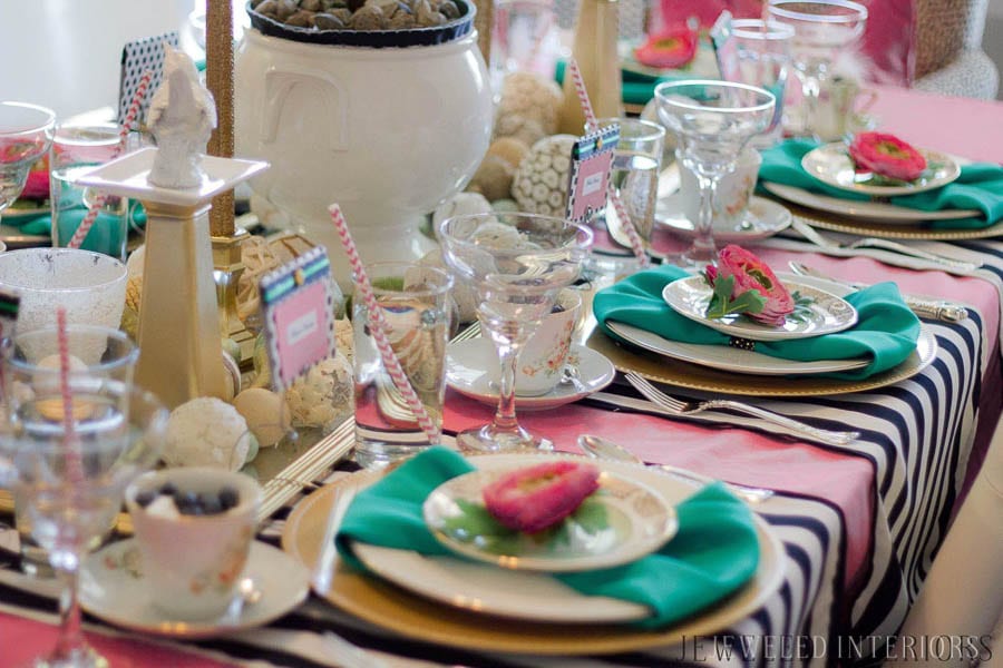 I learned so much from this 8 step tutorial on how to set a pretty tablescape! || Jeweledinteriors, jeweled interiors, party, planning, dinner, brunch, banquet, table, setting, centerpiece, placemats, napkin, pomegranate, feather, gold, salad, charger, placemat, rings, flowers, candles, vintage, dollar store, beautiful, sequin, sheepskin, texture