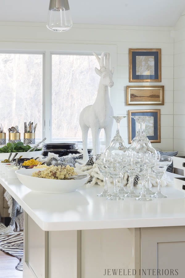 Apres Ski Party Blog Hop|| Jeweled Interiors, party, ski, buffet, tablescape, table, setting, black and white, candles, brass, potato bar, mashed potato, china, vintage, brass, candle stick, buffet line, simple, easy, lunch, dinner, brunch, buffet, flowers 