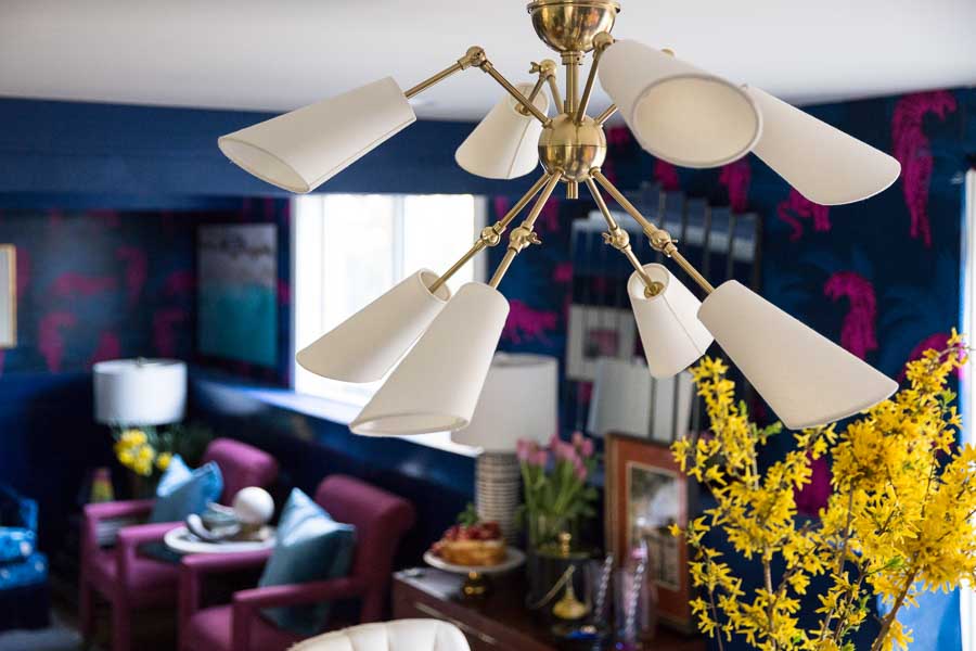 This Buckingham Chandelier Hudson Valley Lighting from Lamps plus is incredible! I love the way is mixes with this bold and eclectic room