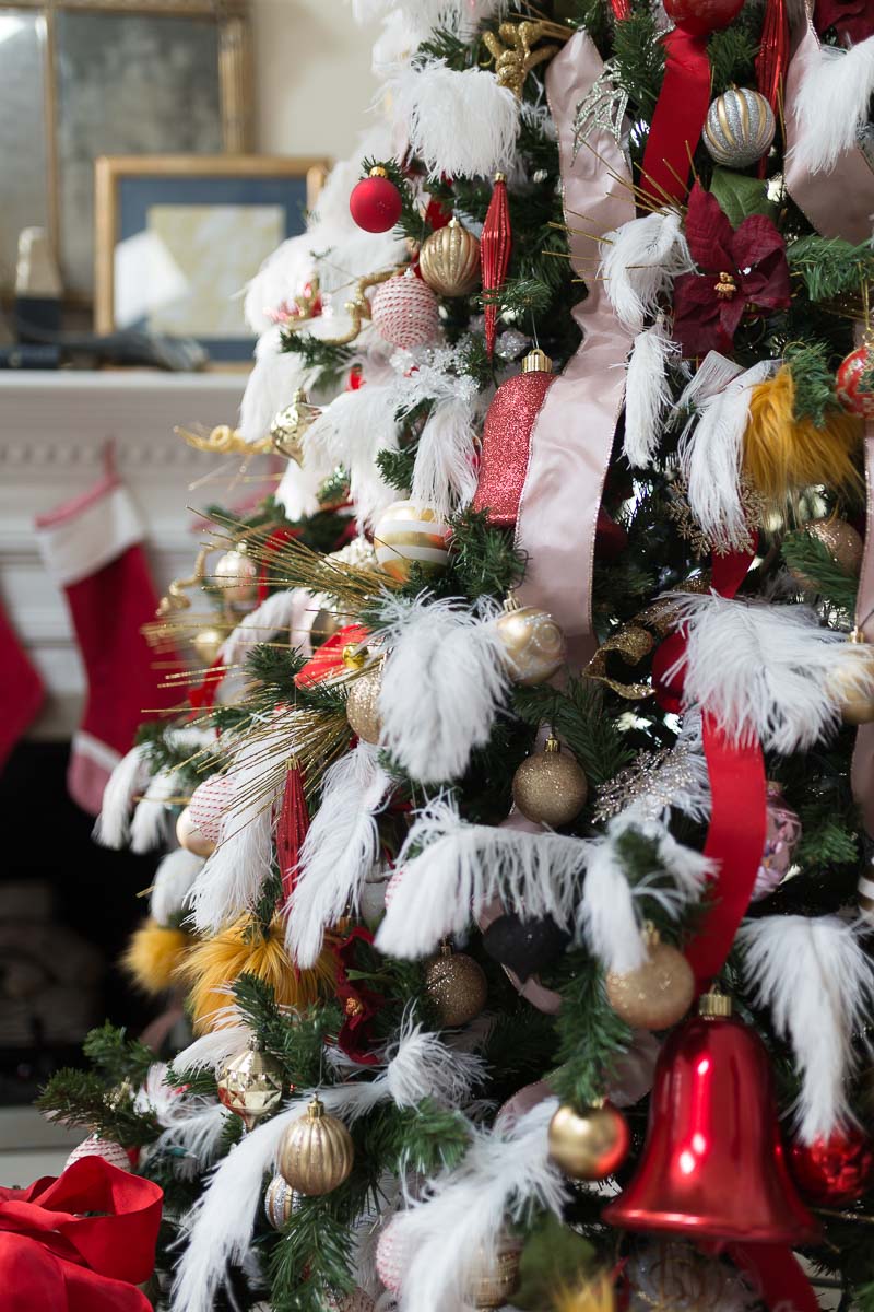 miles redd inspired Christmas, Christmas trends, how to decorate a Christmas tree, miles redd, designer tree, Christmas tree ideas, Christmas tree decorations, Christmas tree themes, Christmas tree decorating ideas, red and pink, pink Christmas tree, ostrich feathers