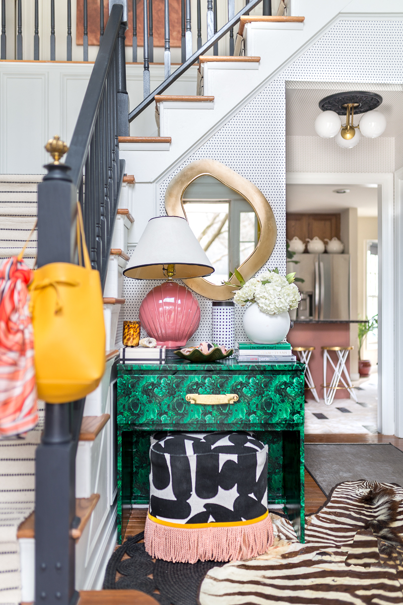 Check out this colorful and eclectic entryway, entryway, milton and king, simplimente puntos, wallpaper, mitzi lighting, foyer, art deco, eclectic, fringe, ottoman, malachite, contemporary, black handrails, diy stair runner, m