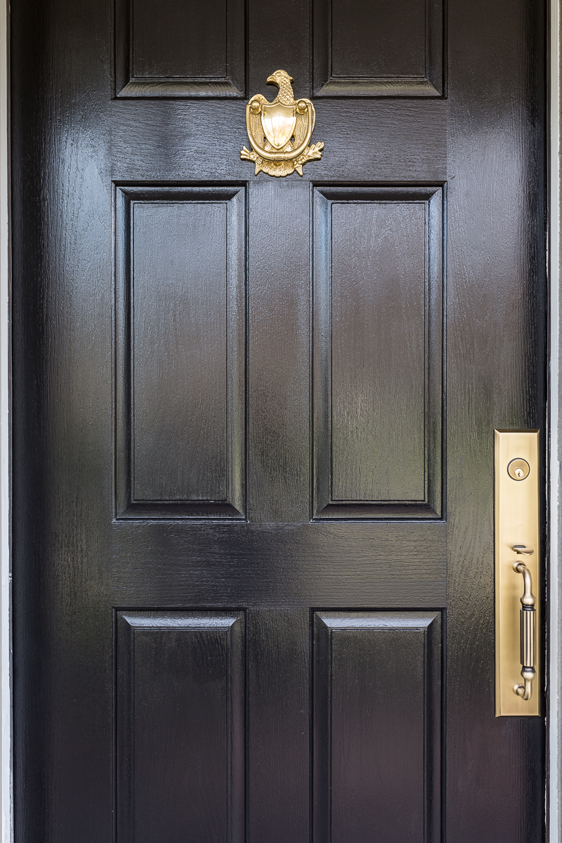 check out this black front door with brass hardware, federalist eagle knocker, vintage knocker, brass knocker, colonial knocker, grandeur hardware, jewel marlowe, jeweled interiorsors, 