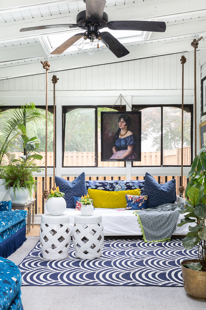 You've got to see this! sunroom big reveal, maximalist room, maximalist sofa, maximalist sunroom, blue sofa, sofa with fringe, fringed sofa, terrazzo sofa, jeweled interiors, budget make over, budget sunroom makeover,  bed swing, twin bed swing, sunroom bed swing, bohemian sunroom, colorful sunroom, Jeweledinteriors, DIYs