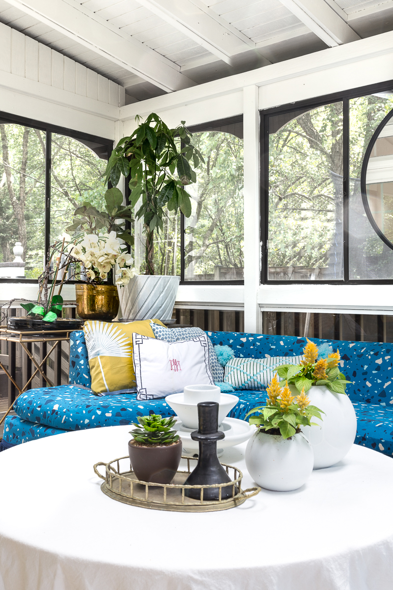 You've got to see this! sunroom big reveal, maximalist room, maximalist sofa, maximalist sunroom, blue sofa, sofa with fringe, fringed sofa, terrazzo sofa, jeweled interiors, budget make over, budget sunroom makeover,  bed swing, twin bed swing, sunroom bed swing, bohemian sunroom, colorful sunroom, Jeweledinteriors, DIYs