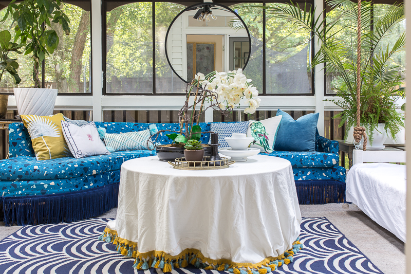 You've got to see this! sunroom big reveal, maximalist room, maximalist sofa, maximalist sunroom, blue sofa, sofa with fringe, fringed sofa, terrazzo sofa, jeweled interiors, budget make over, budget sunroom makeover,  bed swing, twin bed swing, sunroom bed swing, bohemian sunroom, colorful sunroom, Jeweledinteriors, DIYs