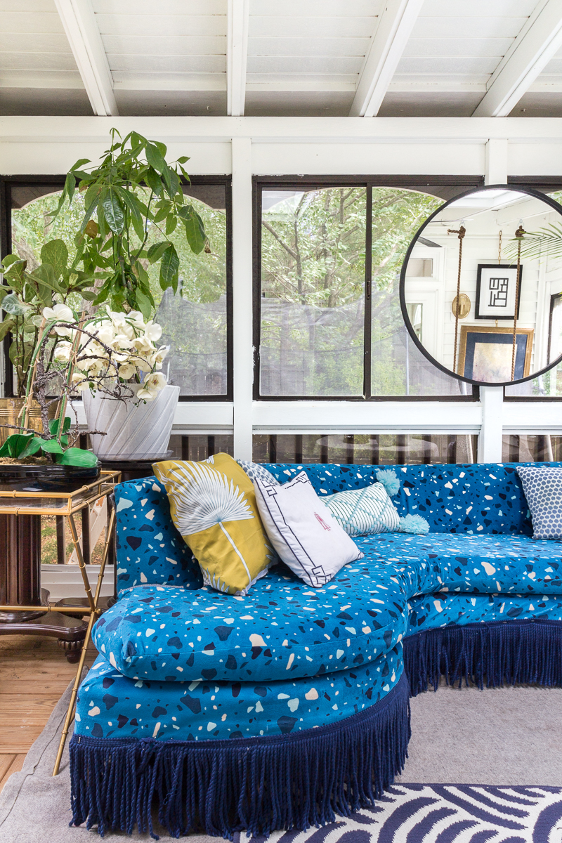 You've got to see this! sunroom big reveal, maximalist room, maximalist sofa, maximalist sunroom, blue sofa, sofa with fringe, fringed sofa, terrazzo sofa, jeweled interiors, budget make over, budget sunroom makeover,  bed swing, twin bed swing, sunroom bed swing, bohemian sunroom, colorful sunroom, Jeweledinteriors, DIYs