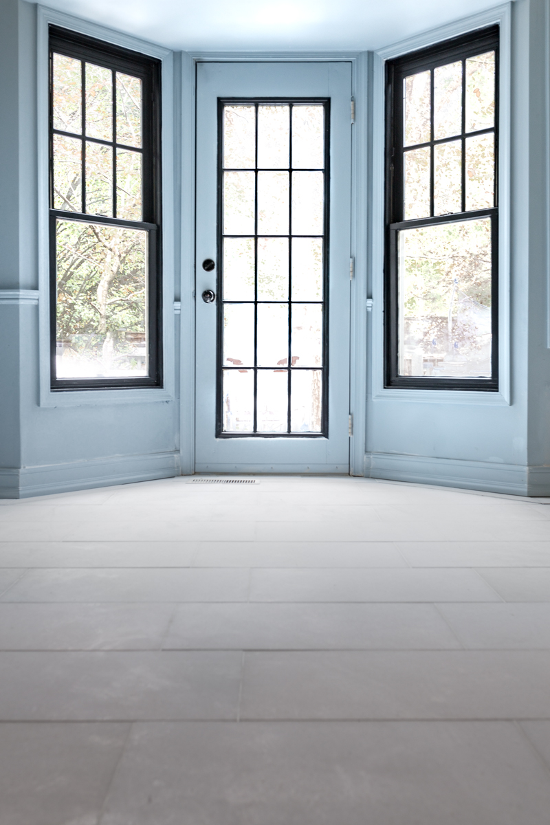 The Tile Shop San Dona marble floors with black pinstripe and Parma grey walls