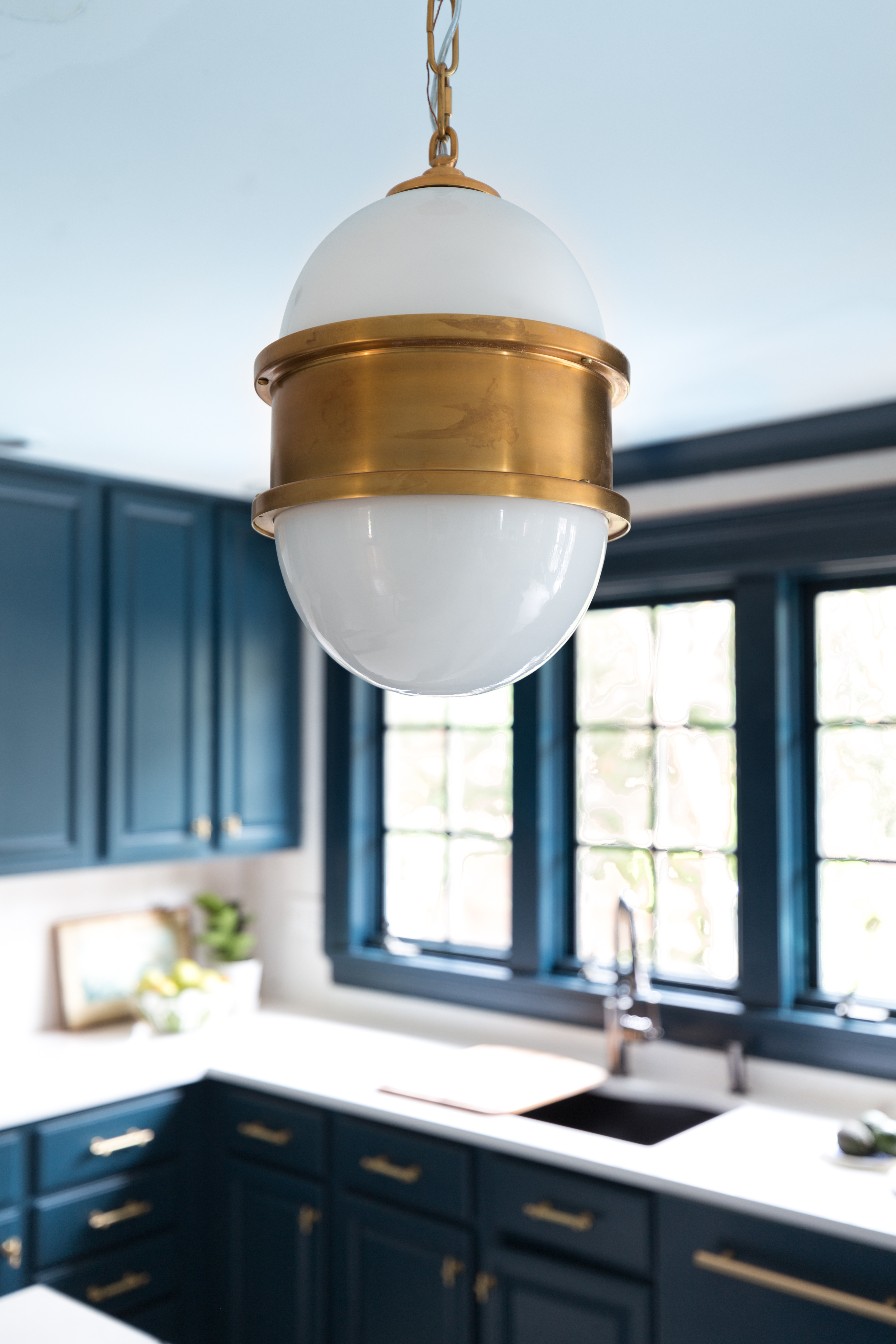 Wowzers! Check out this reveal from Jeweled Interiors Fall 2019 ORC, one room challenge. Broomley sconce, Corbett Lighting, hague blue cabinet, kitchen