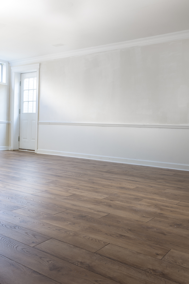 Why We Installed Select Surfaces Laminate Floors In Our Basement