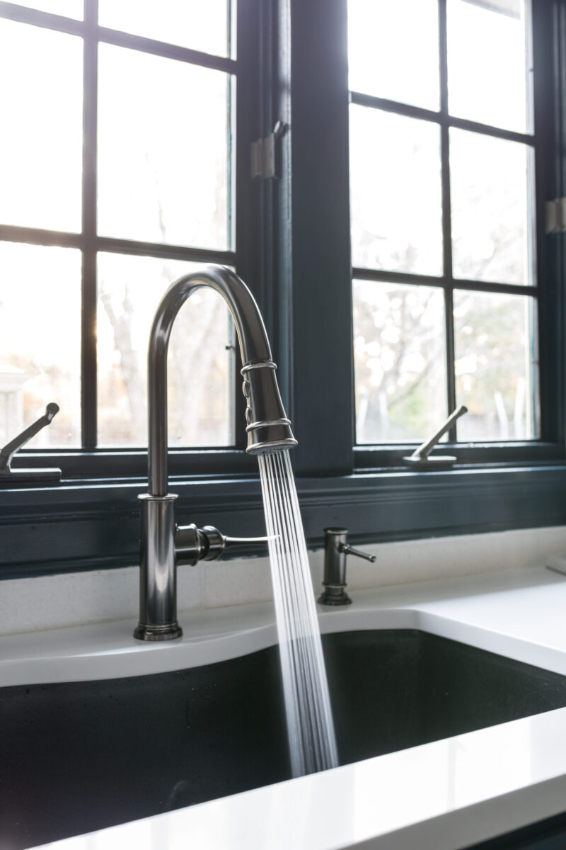 Check out this gorgeous blue kitchen with elkay kitchen sink and faucet