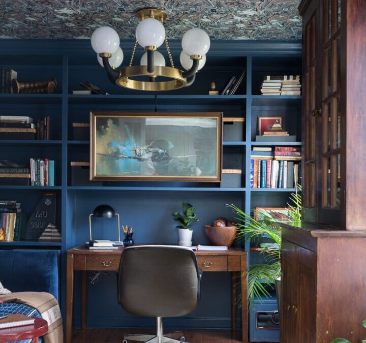 Home office with blue bookshelves and desk. ⋆ Jewel Marlowe