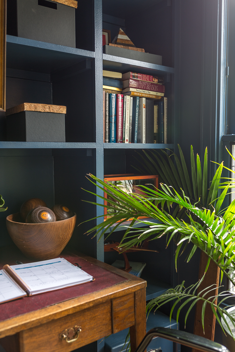 CHECK OUT this office reveal!  Stiffkey blue, spoonflower, farrow and ball, Werner, Hudson valley lighting, hvlg, fringed sofa, airplane art, navy blue office, pilot's office, masculine office, navy blue office, antique desk, antique bookcase