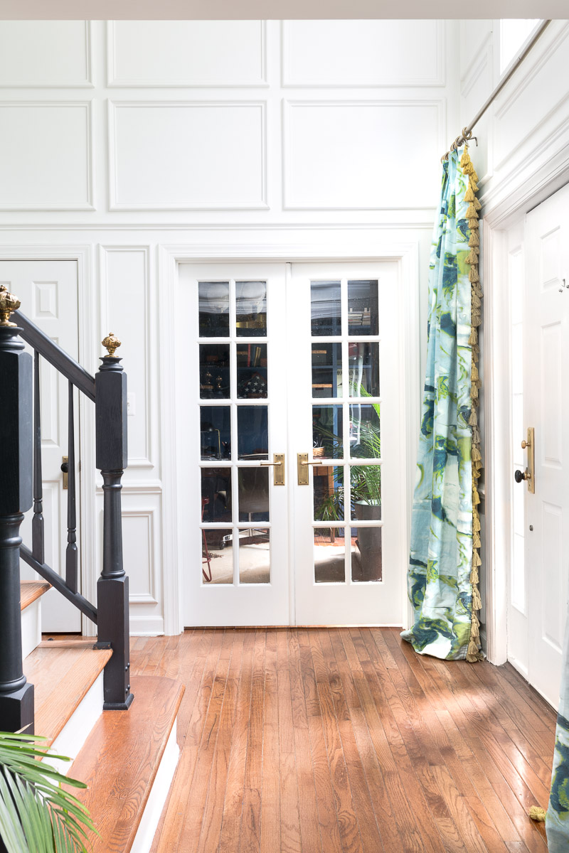 CHECK OUT this office reveal! Werner chandelier, Stiffkey blue, spoonflower, farrow and ball, Werner, Hudson valley lighting, hvlg, airplane art, navy blue office, pilot's office, masculine office, navy blue office, antique desk, antique bookcase