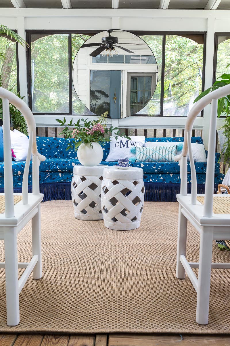 AMAZING sunroom ideas!!! mohawk rug, Montuak, canopy bed, bed swing, sun room, sunroom, budget sunroom, blue and white sunroom, terrazzo sofa, greek key