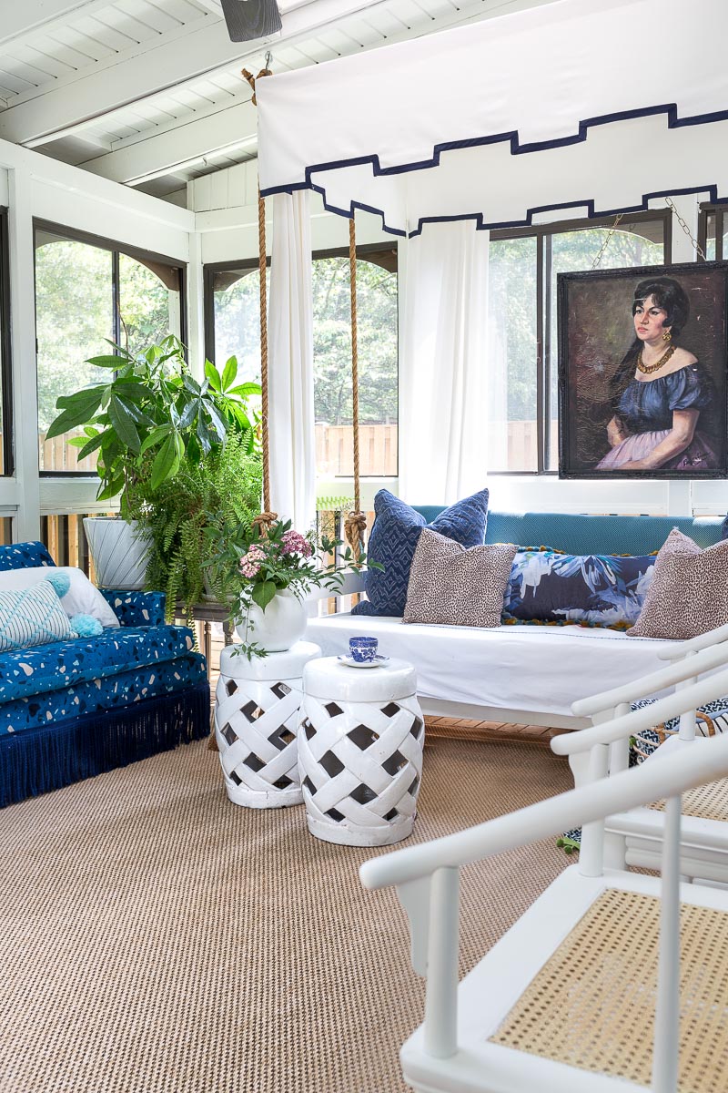 AMAZING sunroom ideas!!! mohawk rug, Montuak, canopy bed, bed swing, sun room, sunroom, budget sunroom, blue and white sunroom, terrazzo sofa, greek key