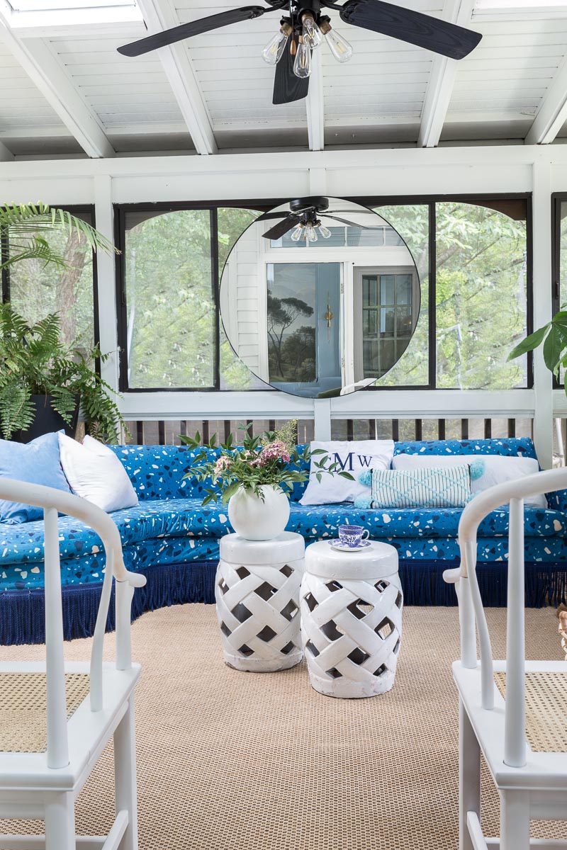 AMAZING sunroom ideas!!! mohawk rug, Montuak, canopy bed, bed swing, sun room, sunroom, budget sunroom, blue and white sunroom, terrazzo sofa, greek key