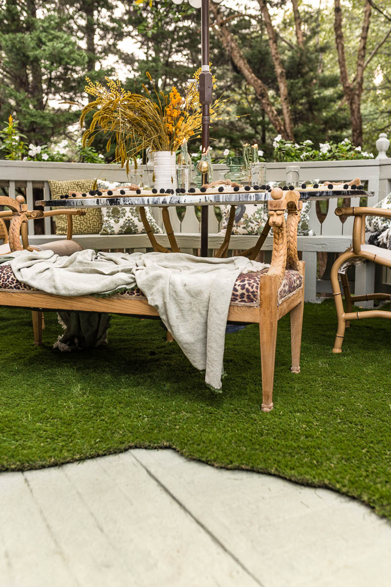 patio decorating ideas, patio ideas, grass rug, antique bench, agate table, deck, entertaining, fall, Anthropologie