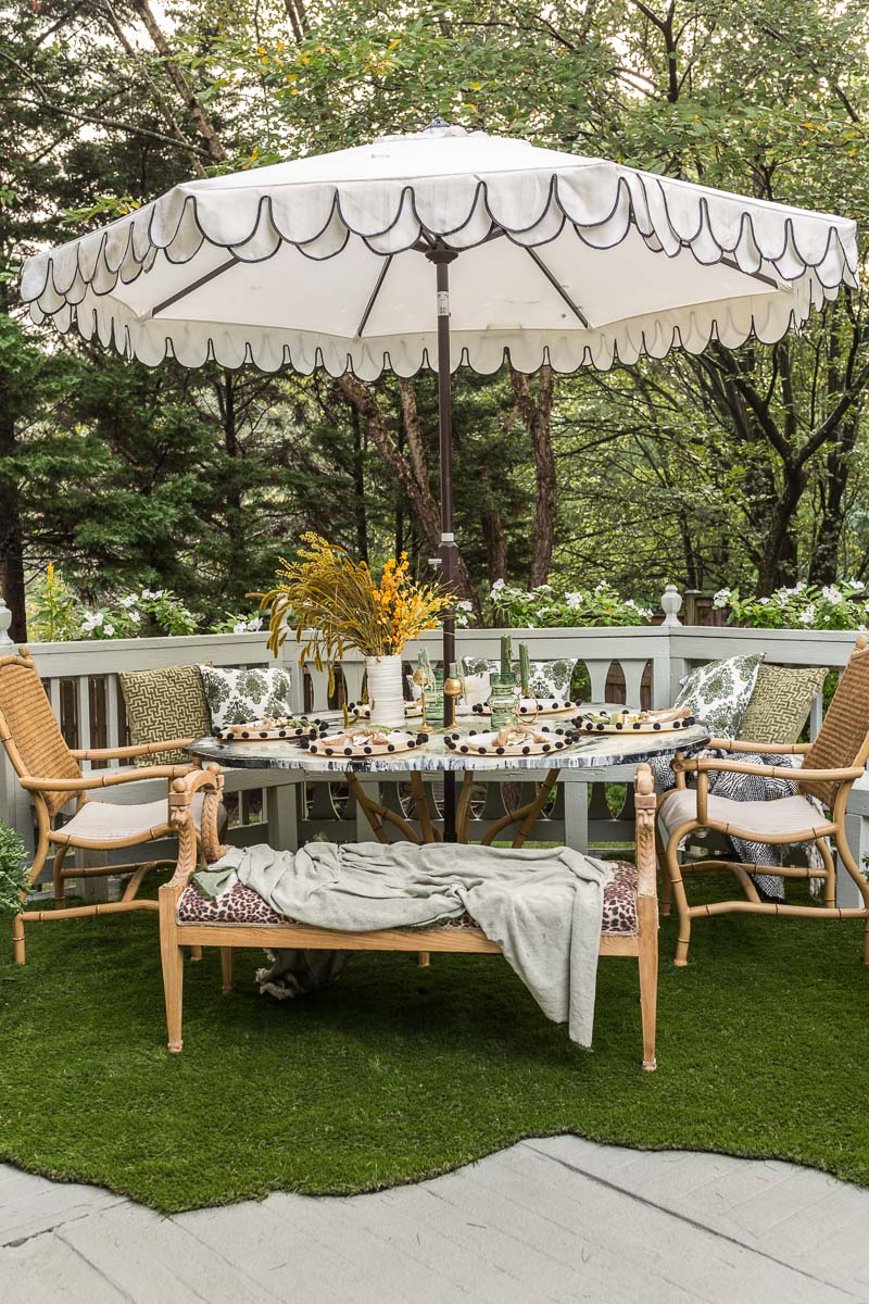 REVEAL! patio decorating ideas, patio ideas, Rustoleum RockSolid, deck resurfacer, artificial grass rug,  Candace Heil, agate table, sailrite, Phiftertex, patio chairs, safaviah, patio umbrella