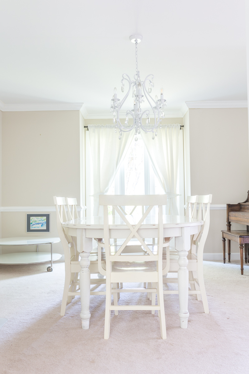 An AMAZING glamorous dining room, makeover, with a tree stump Cambria table, hardwoods, modern crystal chandelier, mural, moulding, Sulking Room Pink , Farrow and Ball, Candace Heil, One Room Challenge, Jewel Marlowe, Jeweled interiors, Fall 2020, Stroheim