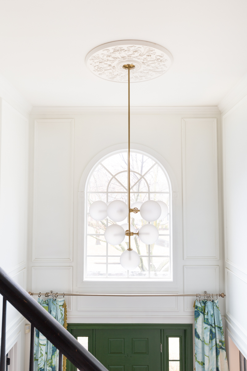 Entryway ideas, entryway, chandelier, moulding, paint, farrow and ball, Kelly Wearstler, California collection, lamps plus, Cascata sconce , drapes, 