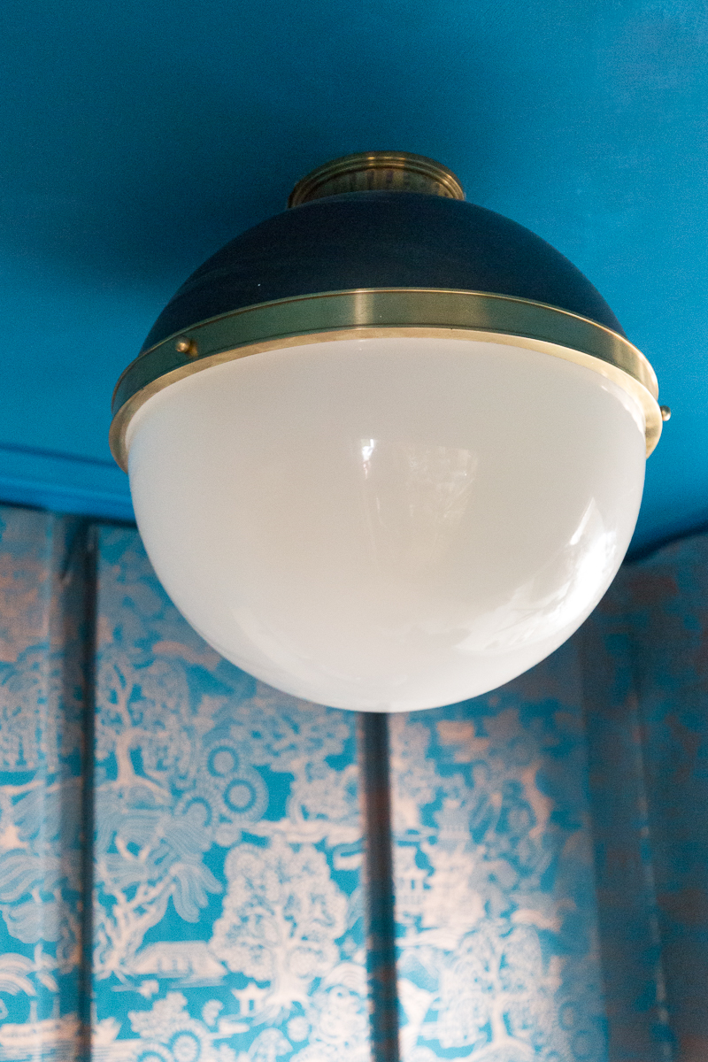 laundry room, wallpapered cabinets, Incredible laundry room lighting, Latham, Hudson Valley Lighting, flush mount, black and brass, semi flush mount