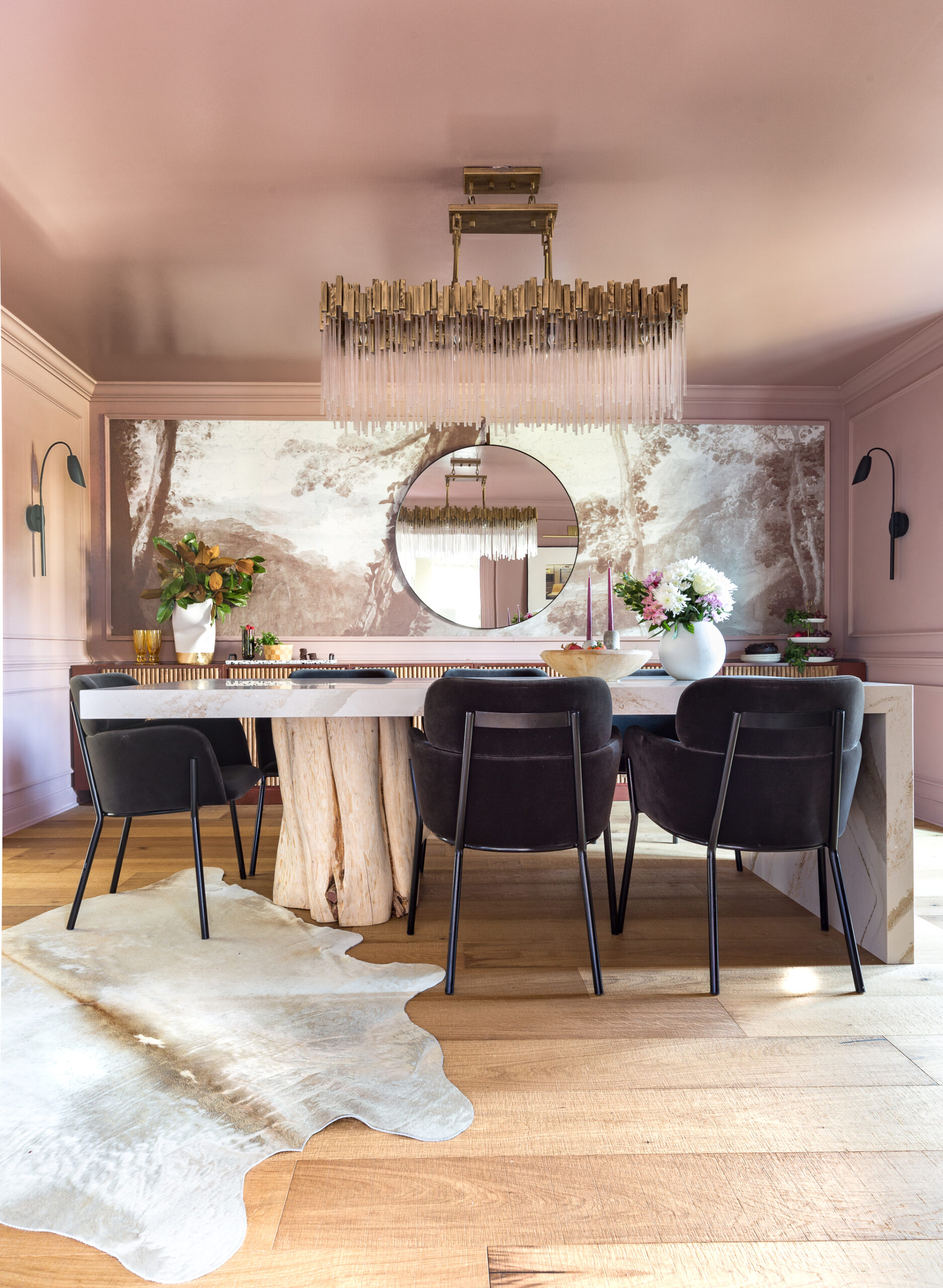 glamorous dining room with tree stump leg and cambria top, waterfall table, sulking room pink