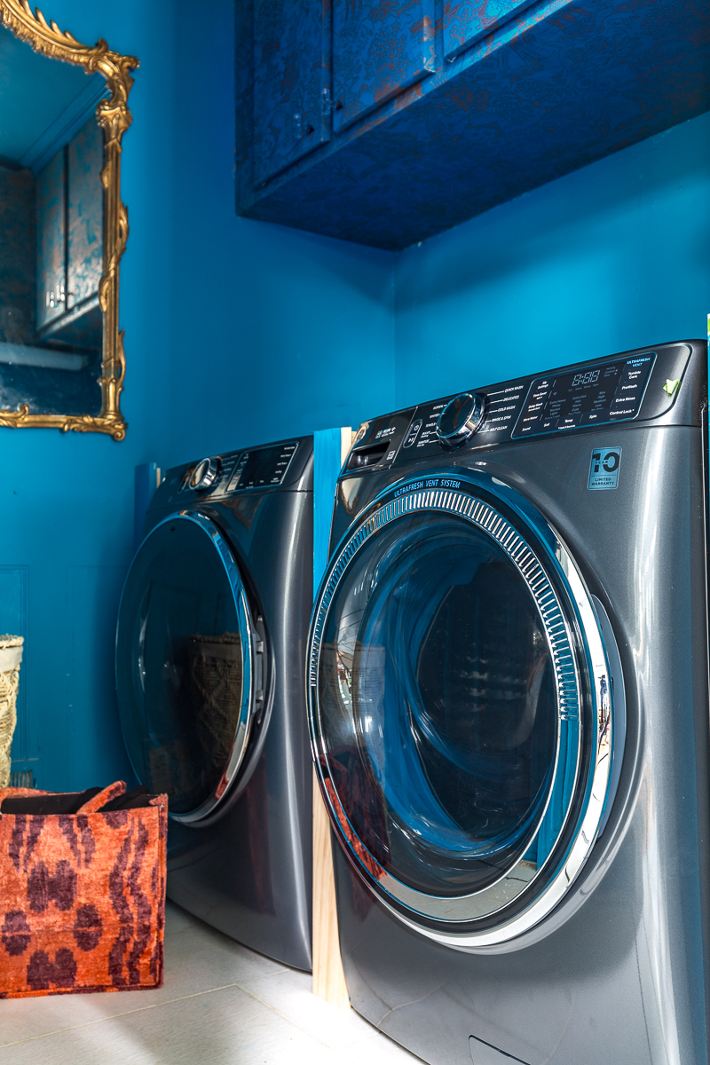 You have to see the updates to this laundry room |Ge, washer and dryer, antimicrobial, no mold, graham and brown wallpaper, small laundry room ideas, teal, wallpaper, laundry room, metallic wallpaper.