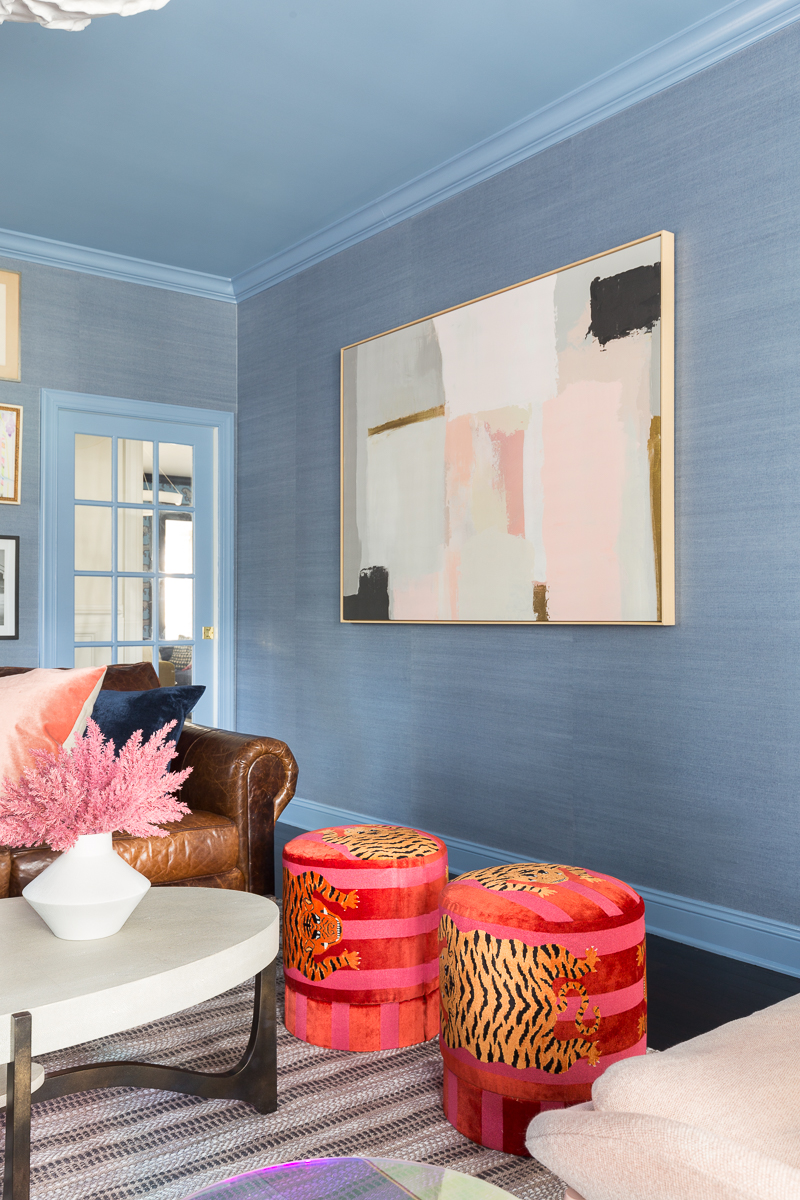 grasscloth, living room, blue, schumacher prado tape, Jakhang tiger, plaster chandelier, sconces, vintage art, gallery wall, minted art, leather chesterfield, y2k, lucite furniture, pink, chairs, piano styling