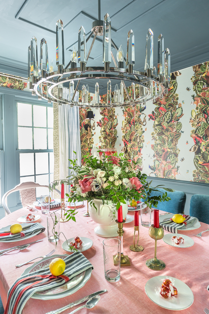 eclectic dining room, ceiling treatment, inchyra blue, Farrow and Ball, wallpaper, bold, modern chandelier, crystorama, Watson chandelier, crystal, silk drapes, milo baughman, chairs, mcm, wishbone chairs, flower arrangement, floral arrangement, tablescape, summer