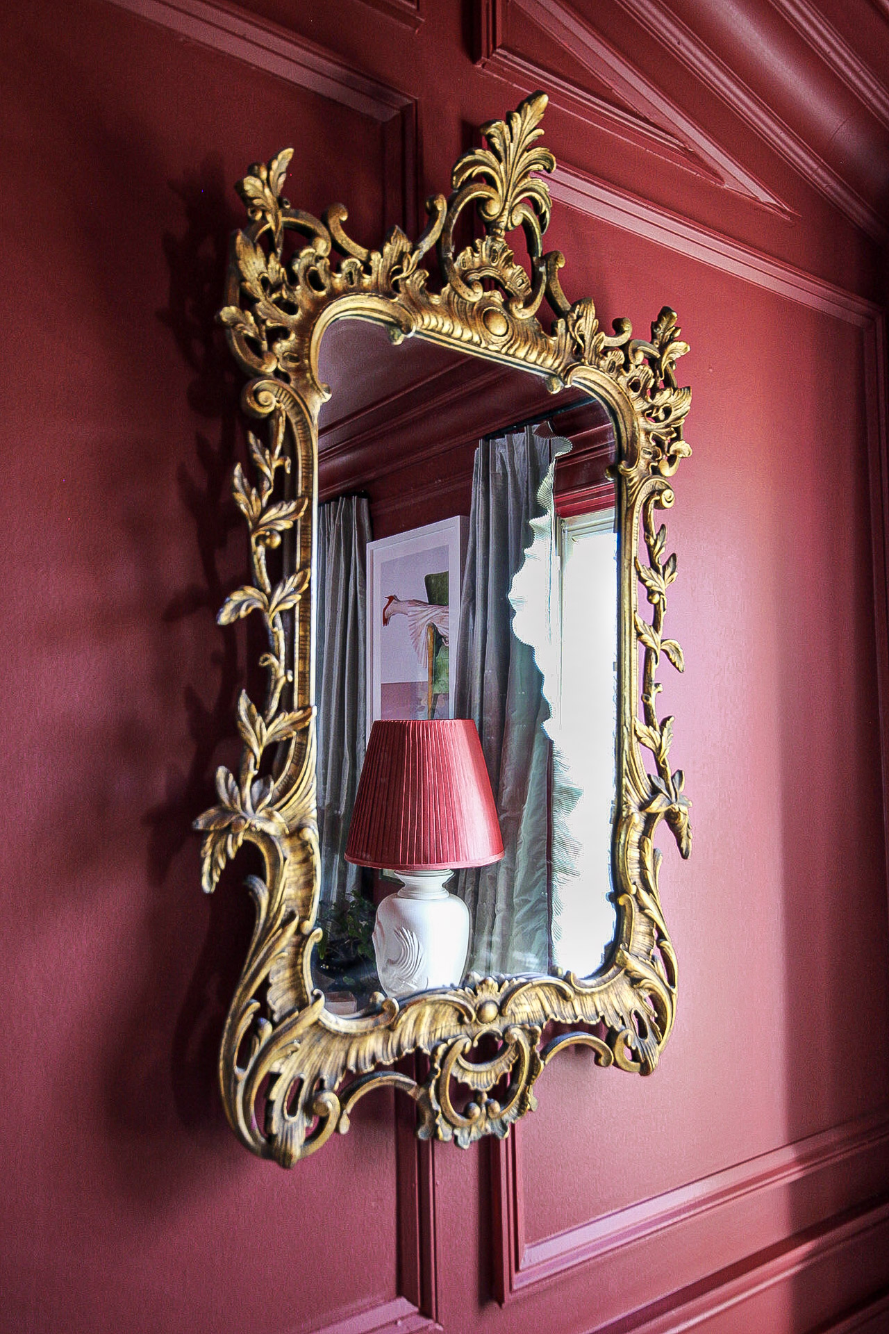 antique mirror, red walls