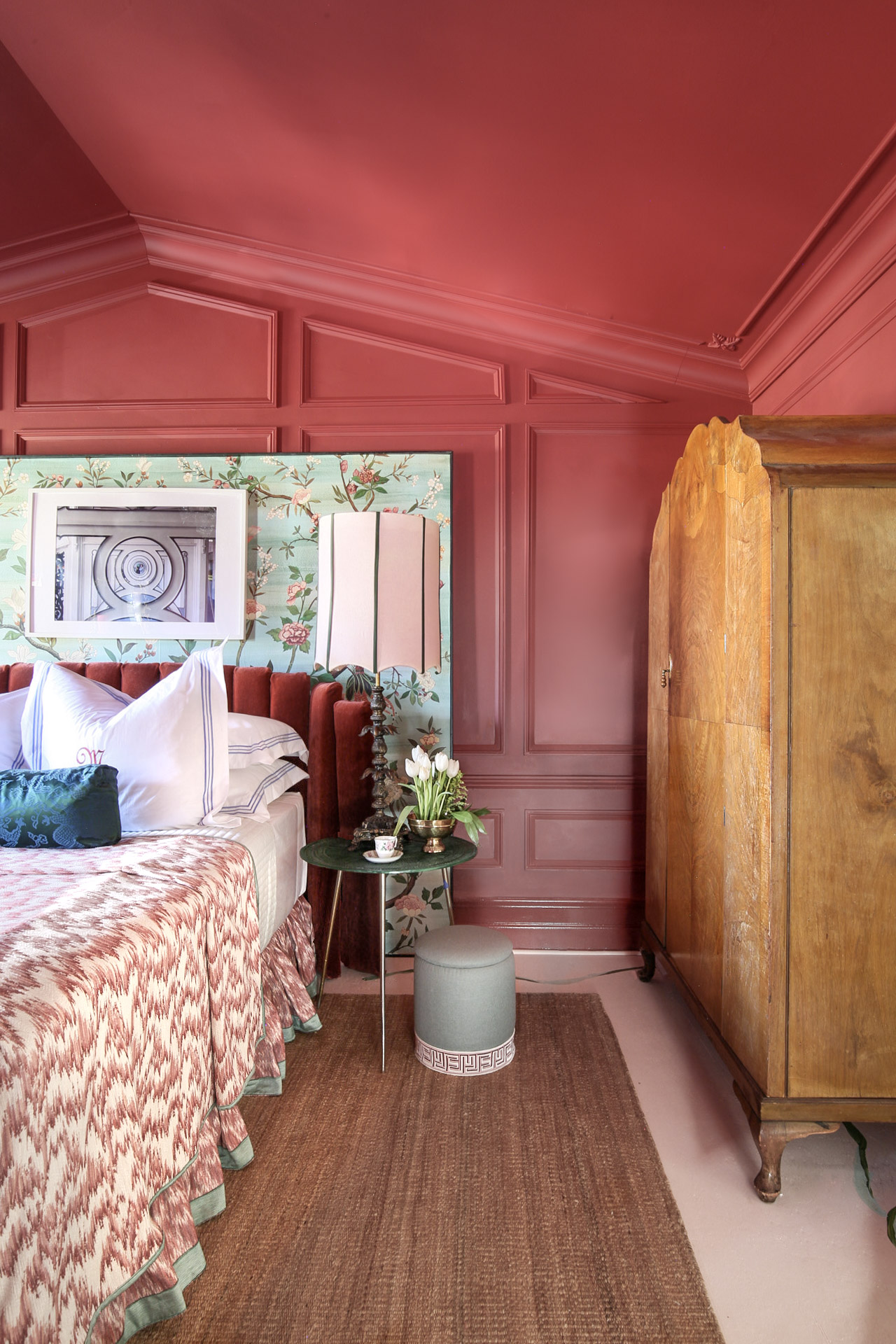 Jewel Marlowe bedroom makeover, red bedroom, red room, art deco, hollywood regency, ruffle bedskirt, molding, channel tufted bed, monogram sheets, sisle rug, fabricut, stroheim, schumacher, flame stitch